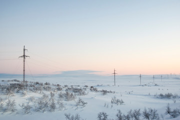 pink dawn in the tundra everywhere white snow nobody  road