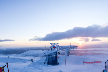 ski booth sunset in the mountains in the tundra everywhere white snow landscape