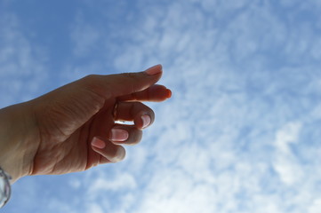 Hand in sky