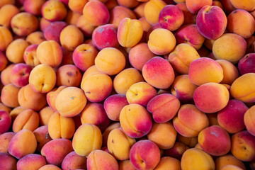 Fresh peaches for sale at a market in France