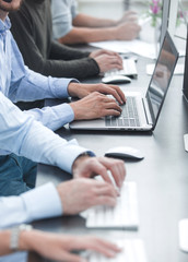 background image of a business team using computers