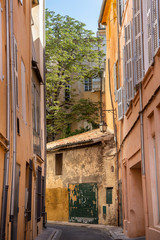 Aix-en-Provence France July 12th 2015: Narrow street in the charming old city of Aix-en-Provence, France