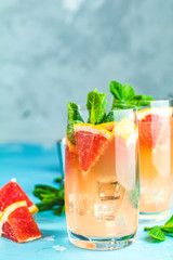 Grapefruit and fresh mint cocktail with juice