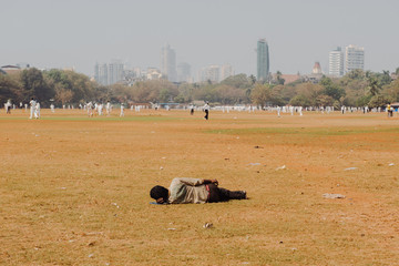 Mumbai cricket field and one tired man