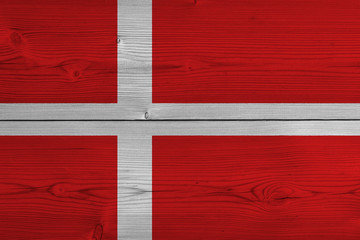 Denmark flag painted on old wood plank