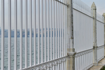 Fototapeta premium Iron railing near the beautiful Istanbul Strait. iron fence. seaside iron fence