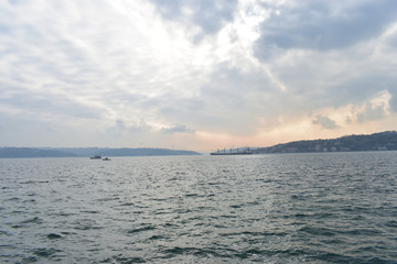 Fototapeta premium Sunset on the Bosphorus.ships passing through the Bosphorus.