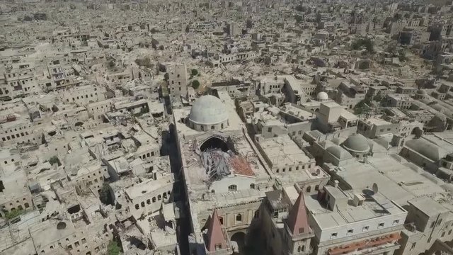 city of Aleppo, Syria, drone flight among the destroyed houses