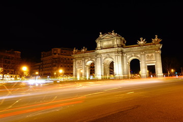 Fototapeta na wymiar The Puerta de Alcala. Alcala Gate is a Neo-classical monument in the Plaza de la Independencia in Madrid.