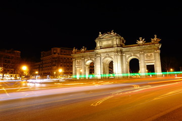 Obraz premium The Puerta de Alcala. Alcala Gate is a Neo-classical monument in the Plaza de la Independencia in Madrid.