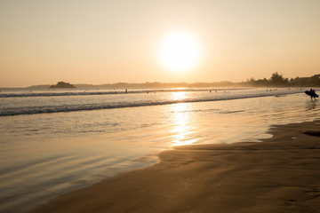 Fototapeta na wymiar Beautiful sunset on seaside beach