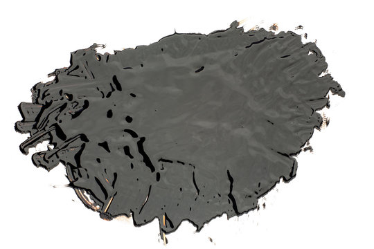 Black tar blob on a white background