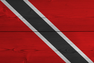 Trinidad and Tobago flag painted on old wood plank