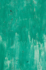 Old iron wall covered with green paint. For design, banner and layout.