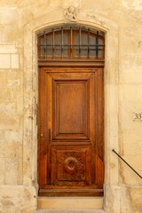 Ornamental wooden doors in Arles, France