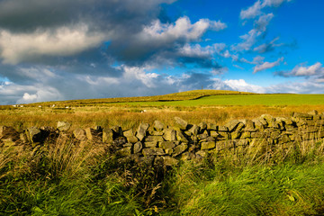 Obraz premium Agricultural fields and moorland at South Pennines on summer