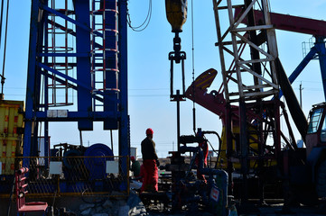 The oil workers in the job