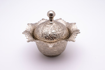embroidered metal bowl.   Traditional Embossed Metal bowl on. Ottoman and Turkish bowl on white...