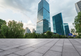 Fototapeta premium empty brick floor and cityscape of modern city near , shuzhou,