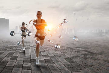 Sportswoman running race. Mixed media