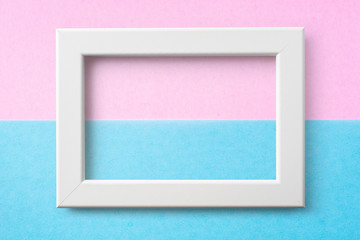 white wood frame with blue and pink paper
