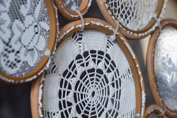 big white Dreamcatcher connectedknitting, handmade decor - concept.