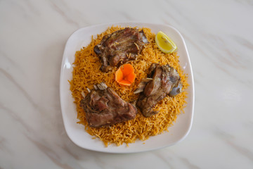 Tasty Arabic non vegetarian food cooked and placed in white bowl  on white background