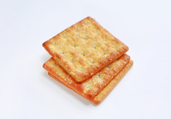Stacked Cracker biscuit on white background. Close up.