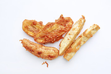 Potato and banana fried on white background.