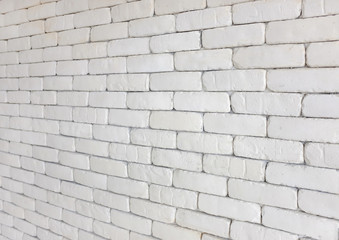 Perspective of white brick wall for texture background.