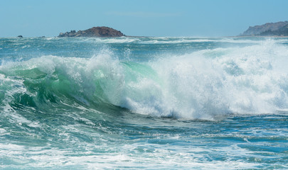 Naklejka premium Huge wave on the blue sea