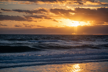 Sunrise off the beach 