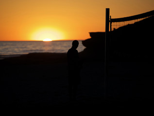sunset on the beach volleyball court