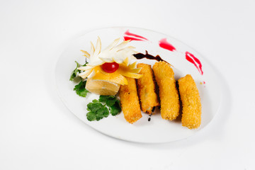 Traditional oriental cuisine of  Vietnam. Tempura chicken breaded with tomato,lemon and herbs