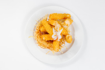 Traditional oriental cuisine of  Vietnam. Tempura cheese in breading on a white background