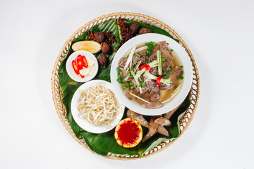 Traditional oriental cuisine of  Vietnam. Pho bo soup with rice noodles, beef, pepper, wheat germ, greens
