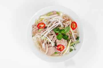 Traditional oriental cuisine of  Vietnam. Pho bo soup with rice noodles, beef, pepper, wheat germ,...