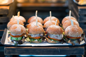 The appetizing burger is placed in a light buffet.