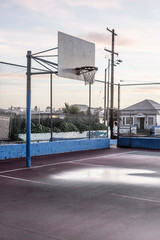 Fototapeta premium basketball hoop taken at sunrise