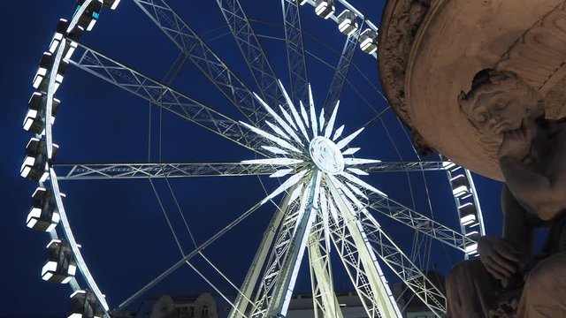 Budapest, Hungary. The Ferris wheel illuminated in white in the evening