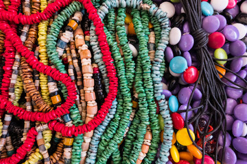 Colorful beads and fake coral necklaces.