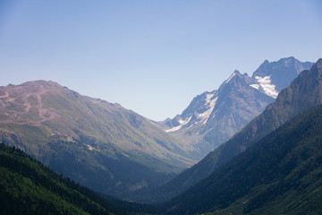 The surroundings of Dombai. Caucasus Mountains summer, clear day.