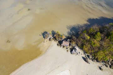 View from above, Stunning aerial view of a little hut on the beautiful Ao Nang Beach during low...