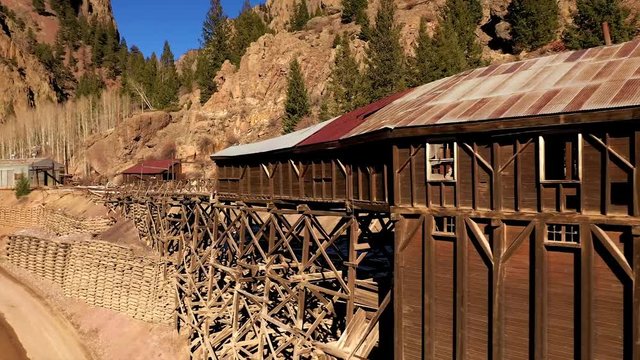 Drone flyby of abandoned Commodore Mine in canyon above Creede, CO.