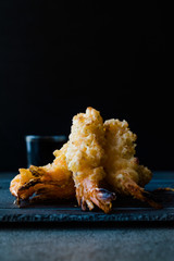 Shrimp Tempura with Soy Sauce on Black  Stone Board.