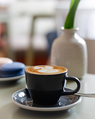 Cup of morning coffee in a coffee shop