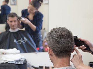 Haircut machine. Man clipping machine in salon. 