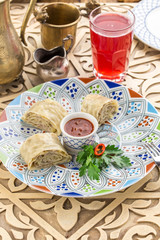 Meat pie pastry with minced beef onions and potatoes on oriental table