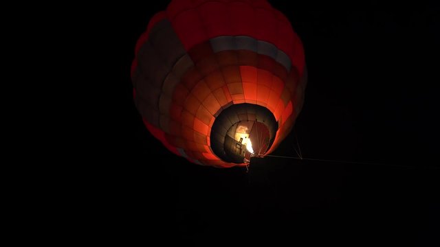 Hot air balloon getting ready for flight at night , outdoors in desert Thar near Pushkar, Rajasthan, India