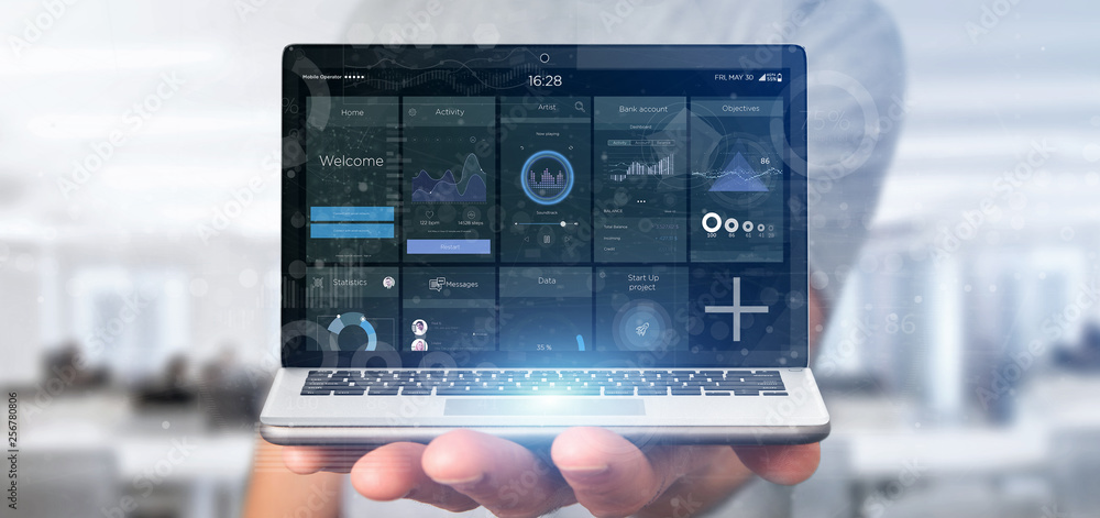 Poster businessman holding laptop with business user interface data on the screen isolated on a background